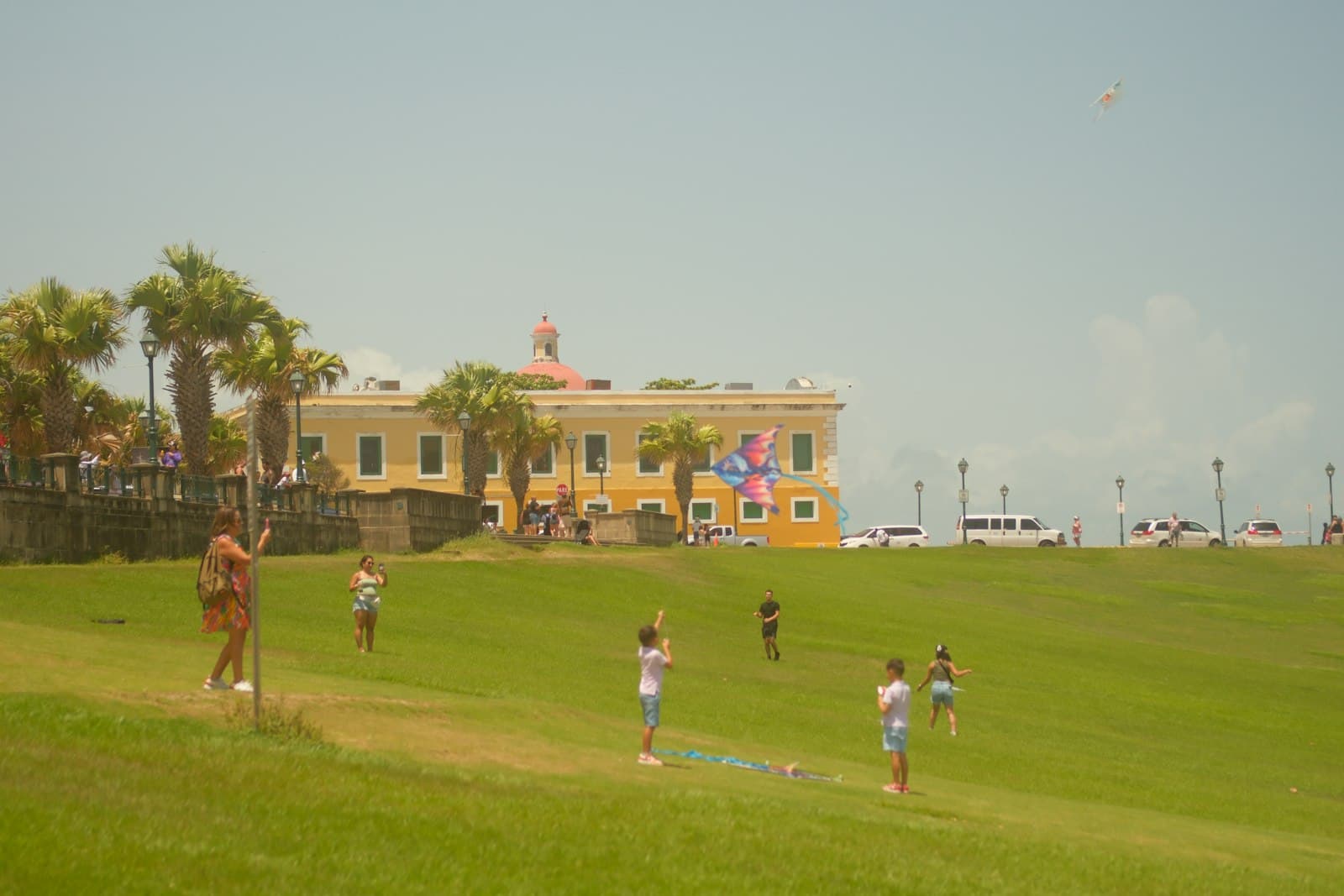 Fly a kite in an open field