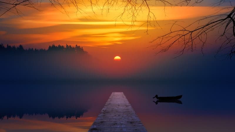 Watch the sunrise or sunset outdoors